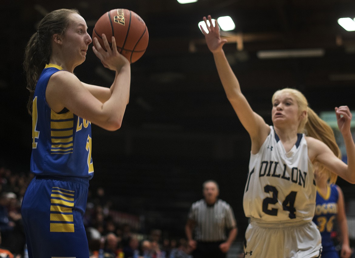 Libby&#146;s Jayden Winslow lines up a shot against Dillon during first-round Western Class A Division tournament play on Feb. 22. (Jeremy Weber/Hungry Horse News)