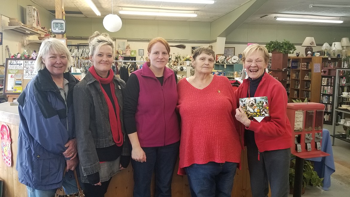 Cheryl Britton presents the check to the Second Chance Animal Adoption. From left: Lori Werder, Anitre Skeen, Melody Moore, Cheryl Britton and Aino Leighton.