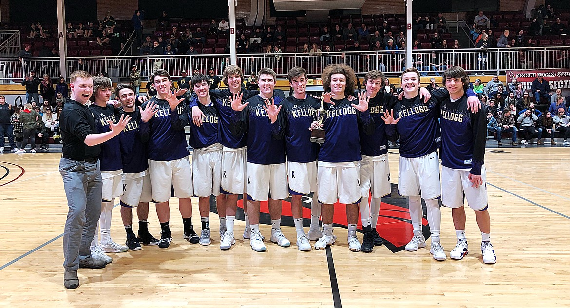 Photo by Josh McDonald
The Kellogg boys basketball team celebrates after winning the 3A District I championship.