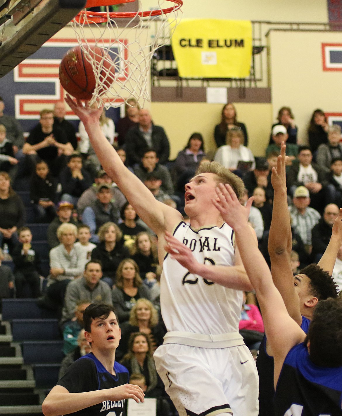 Bob Kirkpatrick/The Sun Tribune - Corbin Christensen drives the lane for two of his team-high 18 points.