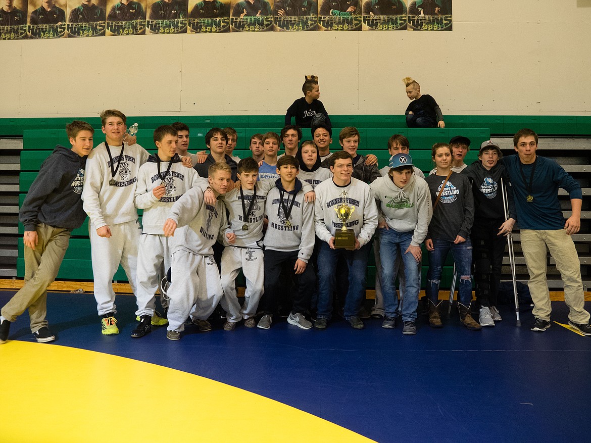 Courtesy Photo
Bonners Ferry Wrestlers pose with their medals and trophy.