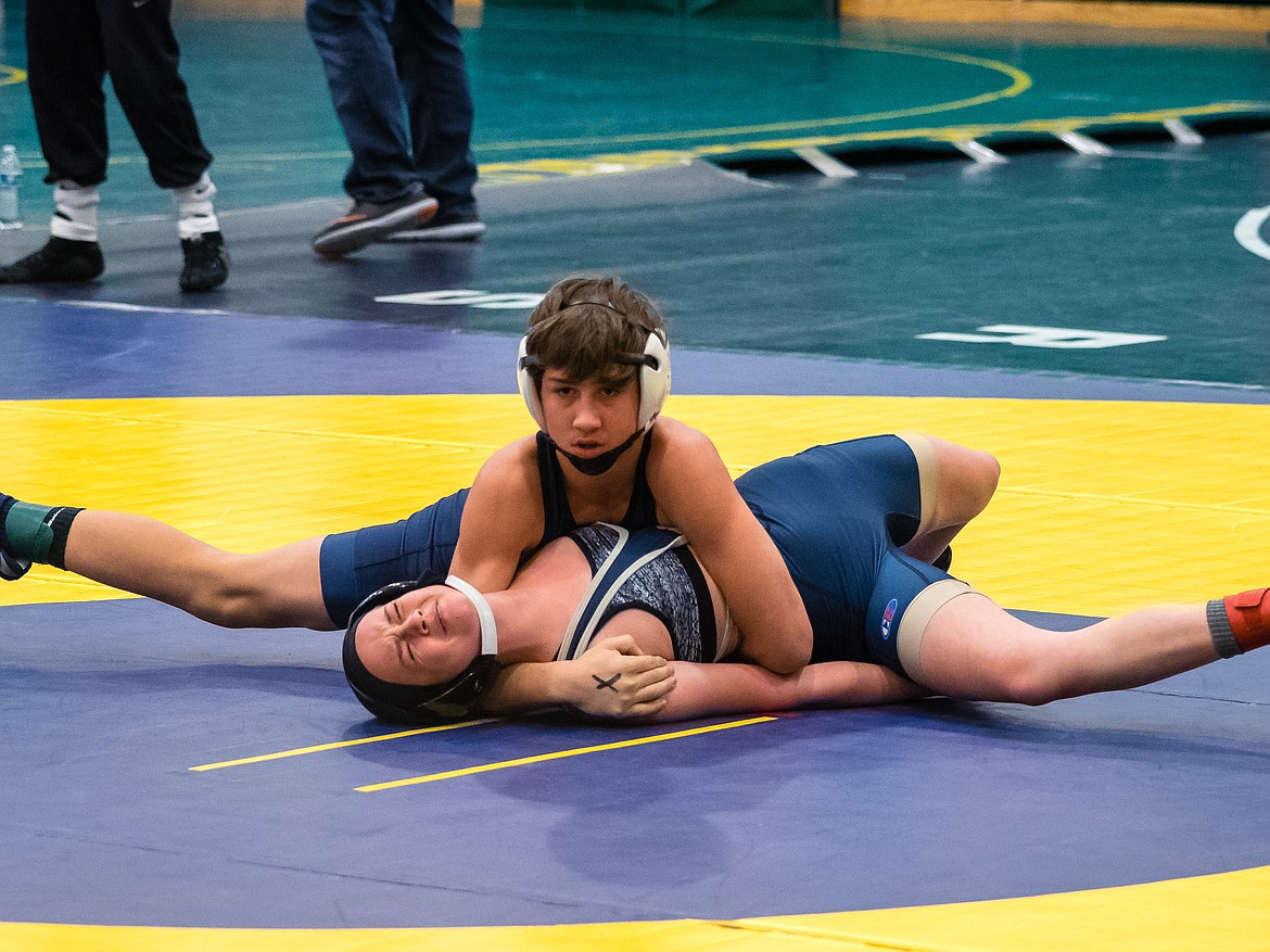 Evan Barajas works for a pin during the 3A district tournament on Saturday at Lakeland High School. Barajas took first in the 106 pound weight class and will compete this weekend at the state wrestling tournament at Idaho State University.

Courtesy photo