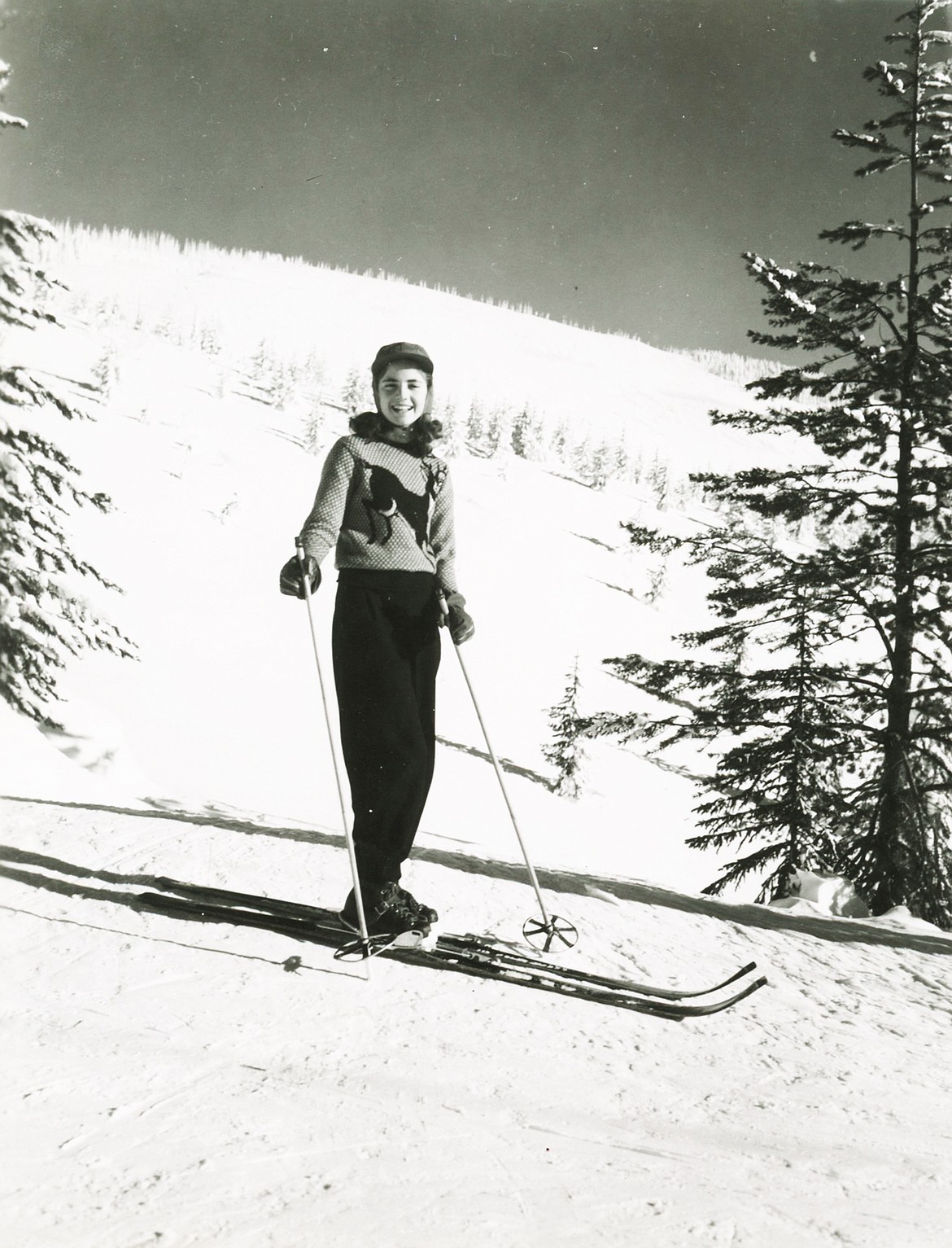 Eighth-grader Sheila Lacy (Morrison) smiles on her skis on Big Mountain in 1949.