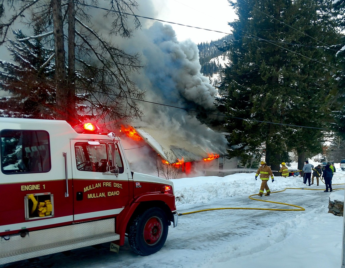 Courtesy photo
Firefighters with Mullan Volunteer respond to the house fire on Oregon Street.