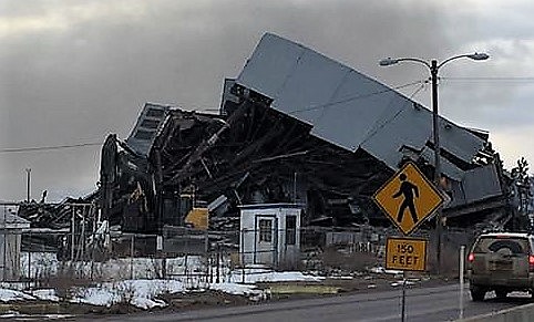 A building at the closed Smurfit-Stone Mill near Frenchtown was blown up on Feb. 1 as a part of the Mills deconstruction. The old mill site is under EPA investigation for contaminants which could leach into the Clark Fork River. (Photo courtesy of the Frenchtown Rural Volunteer Fire Department)