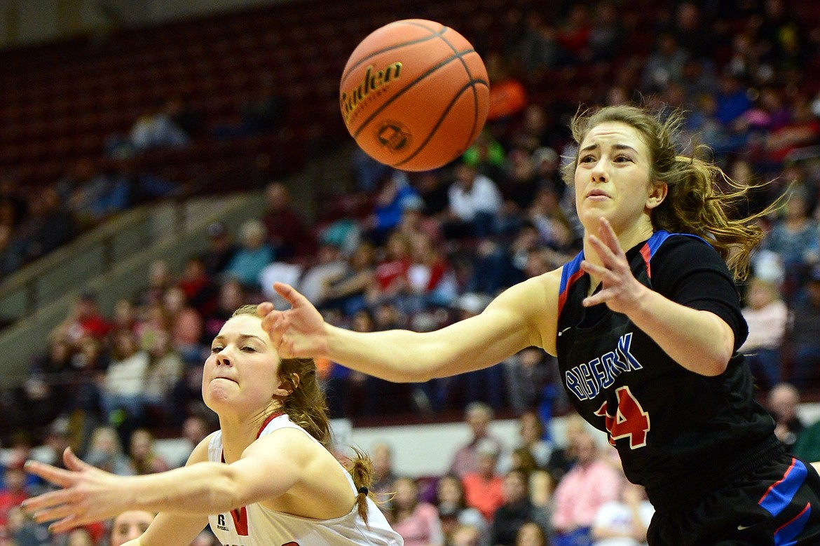 Bigfork's Abby Ellison fights for a loose ball against Three Forks' Morgan Allen in the semifinals of the 2018 State Class B Girls' Basketball Tournament at the Adams Center in Missoula on Friday, March 9. (Casey Kreider/Daily Inter Lake)