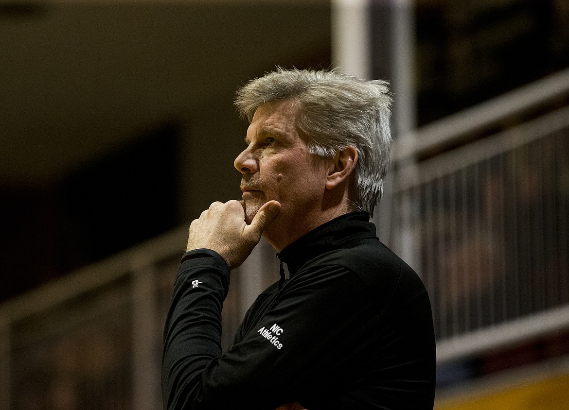 North Idaho College girls basketball coach Chris Carlson watches his team play against Wenatchee Valley College.