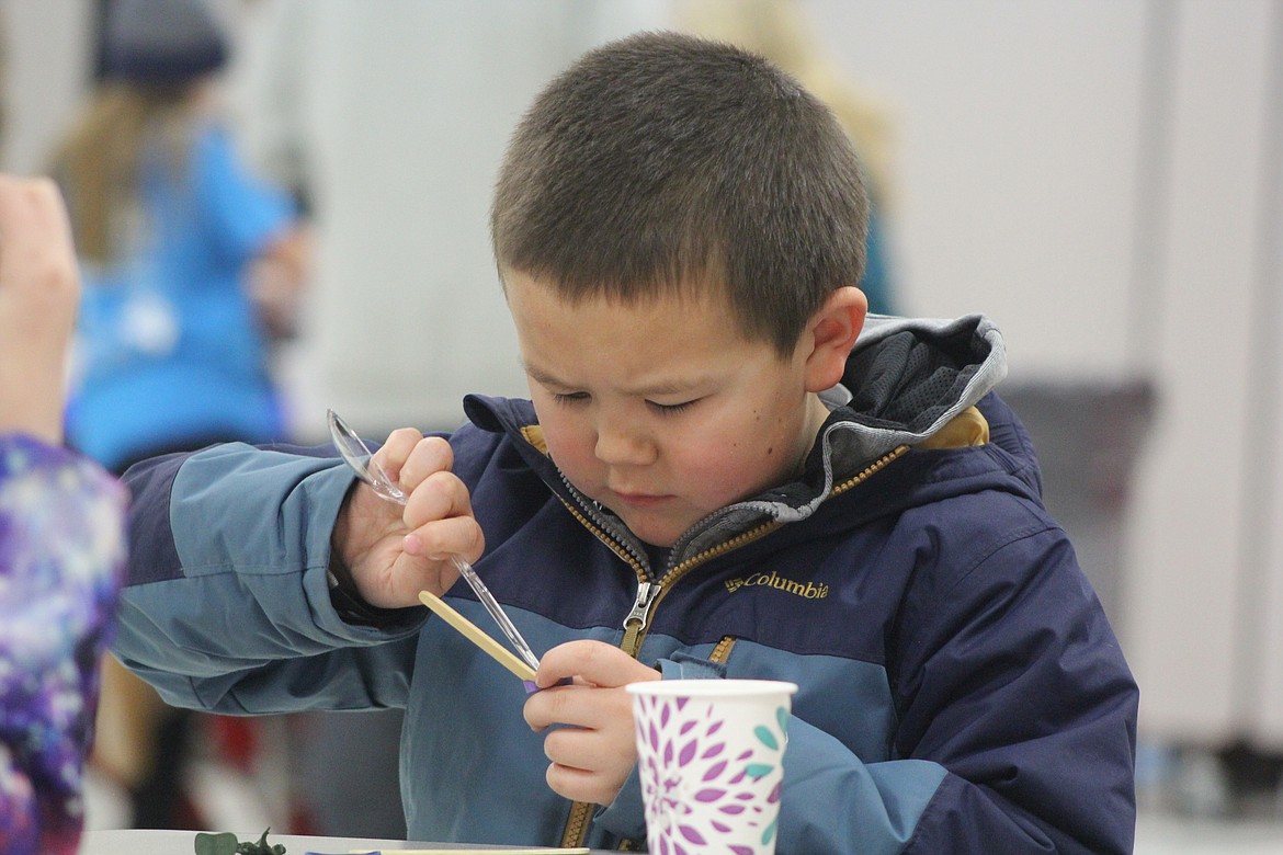 Richard Byrd/Columbia Basin Herald
Mason Palmer works on a project during a Science, Technology, Engineering and Mathematics (STEM) event Thursday night at Lakeview Terrace Elementary.