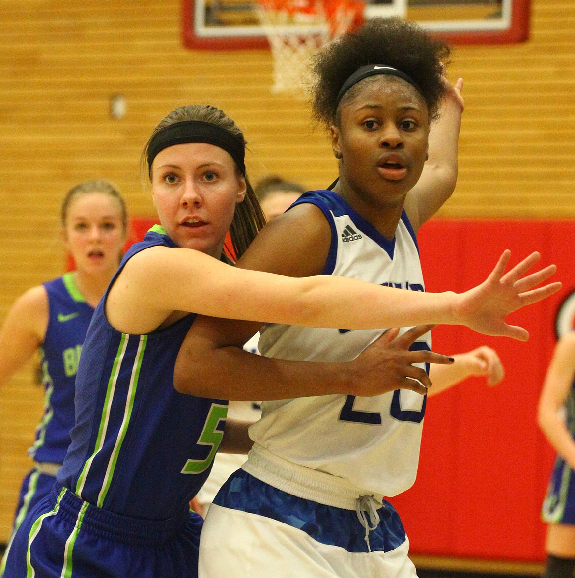 Rodney Harwood/Columbia Basin Herald
Big Bend's Emily Allan (5) fronts NWAC leading scorer Alexia Thrower (20) during the fourth quarter of Thursday's NWAC tournament game at Everett Community College. The Lady Vikings stunned No. 1 seed Grays Harbor to advance to the Elite Eight on Friday.&#160;