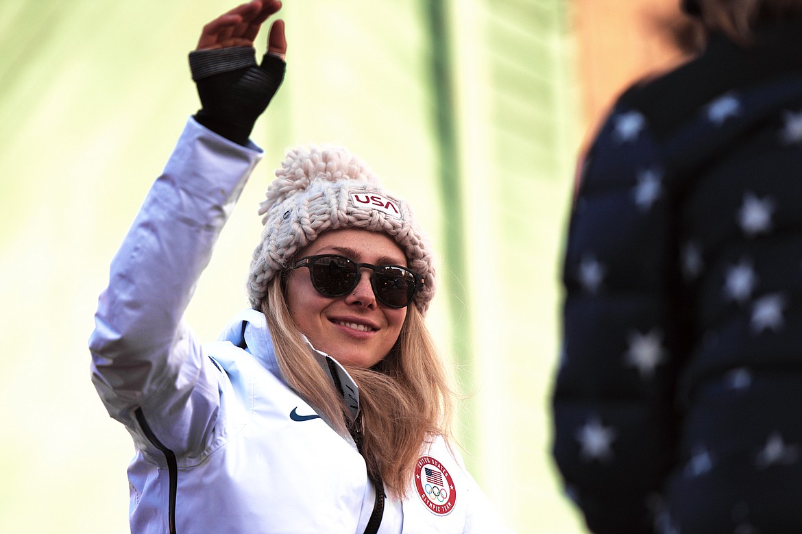 Olympic skier and Whitefish native Maggie Voisin waves to fans during a parade in downtown Whitefish on Wednesday. (Casey Kreider/Daily Inter Lake)