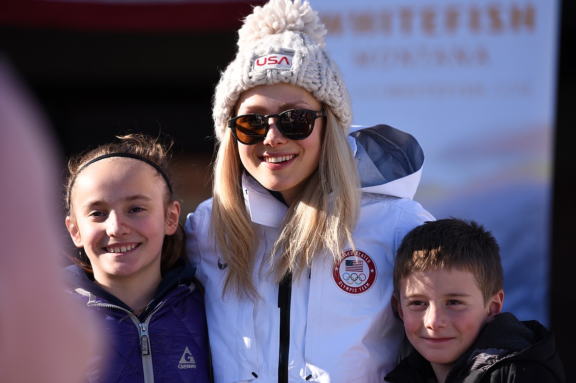 Olympic skier and Whitefish native Maggie Voisin poses for photos with Ena and Carson Herbert outside the O'Shaughnessy Center in Whitefish on Wednesday. (Casey Kreider/Daily Inter Lake)