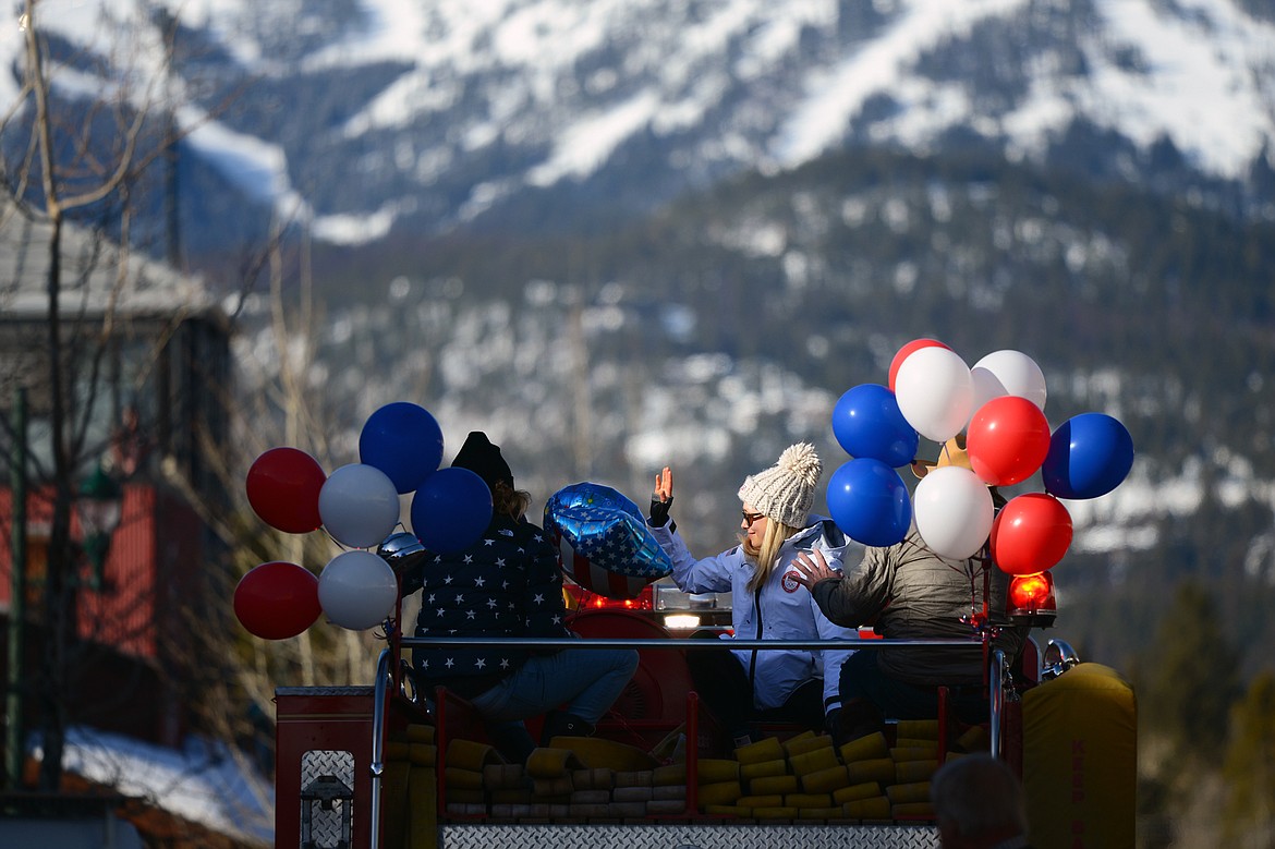 Olympic skier and Whitefish native Maggie Voisin waves to fans during a parade in downtown Whitefish on Wednesday. (Casey Kreider/Daily Inter Lake)