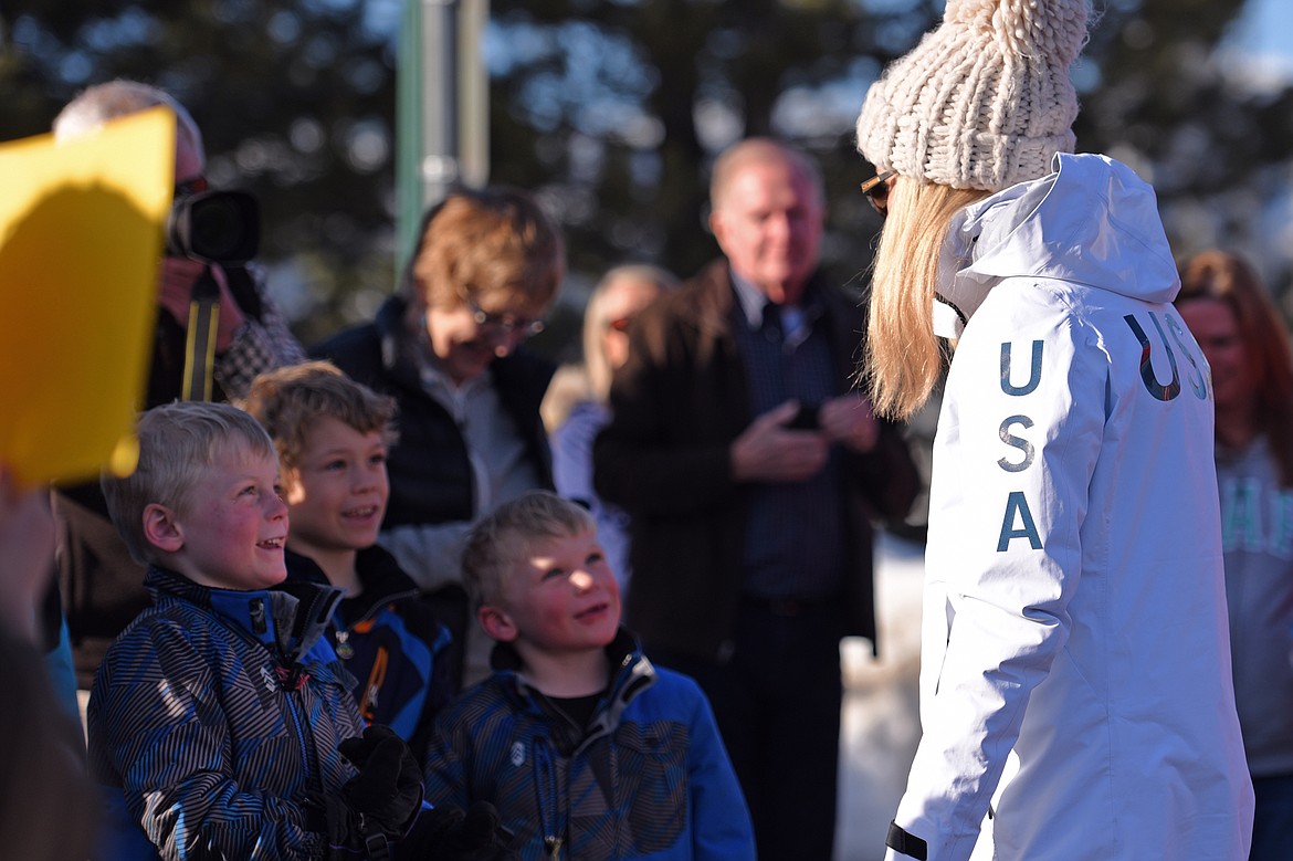 Olympic skier and Whitefish native Maggie Voisin speaks with fans outside the O'Shaughnessy Center in Whitefish after a parade welcoming her home on Wednesday. (Casey Kreider/Daily Inter Lake)