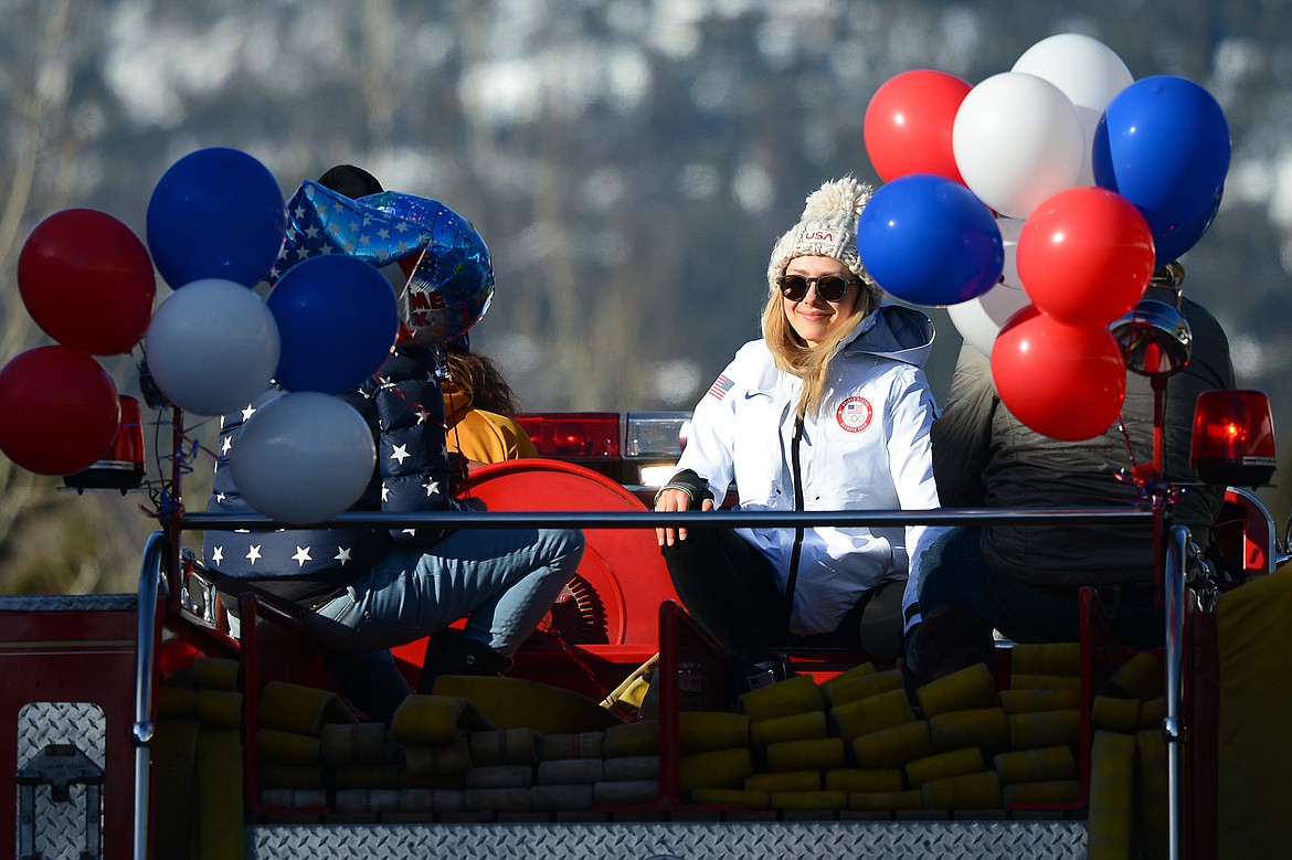 Olympic skier and Whitefish native Maggie Voisin waves to fans during a parade in downtown Whitefish on Wednesday. (Casey Kreider/Daily Inter Lake)