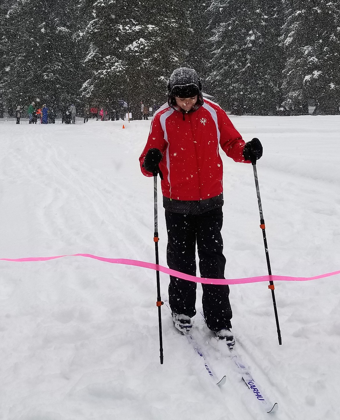 (Courtesy photo)
Bradey Scrimsher crosses the finish line in the 50 meter Nordic race for the Sandpoint team.