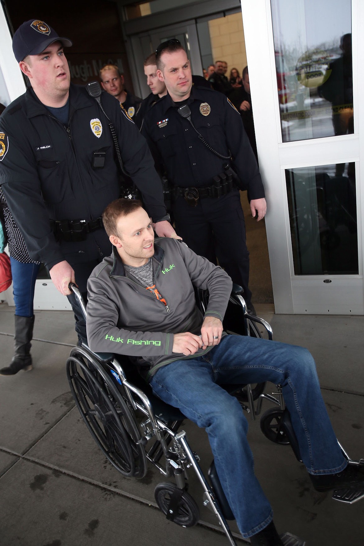 Coeur d&#146;Alene Police patrol officer Charles Hatley was released from Kootenai Health Friday with dozens of his fellow first responders in attendance. (Judd Wilson/PRESS)