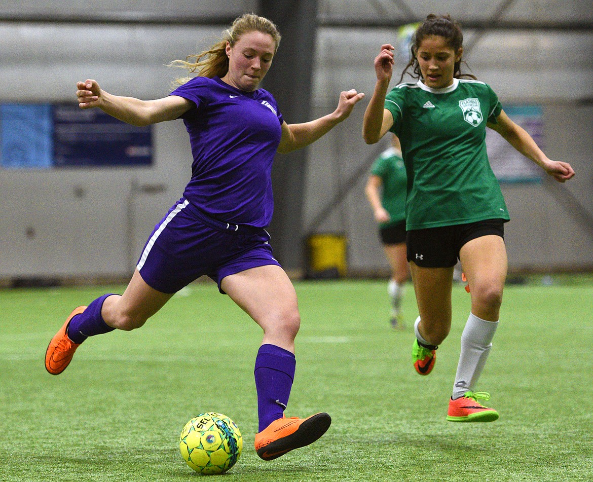 NSC Purple 00's Shayenn Thompson looks to shoot against FVU Flathead Force during the Montana Indoor Soccer Championships at the Flathead County Fairgrounds on Saturday. (Casey Kreider/Daily Inter Lake)