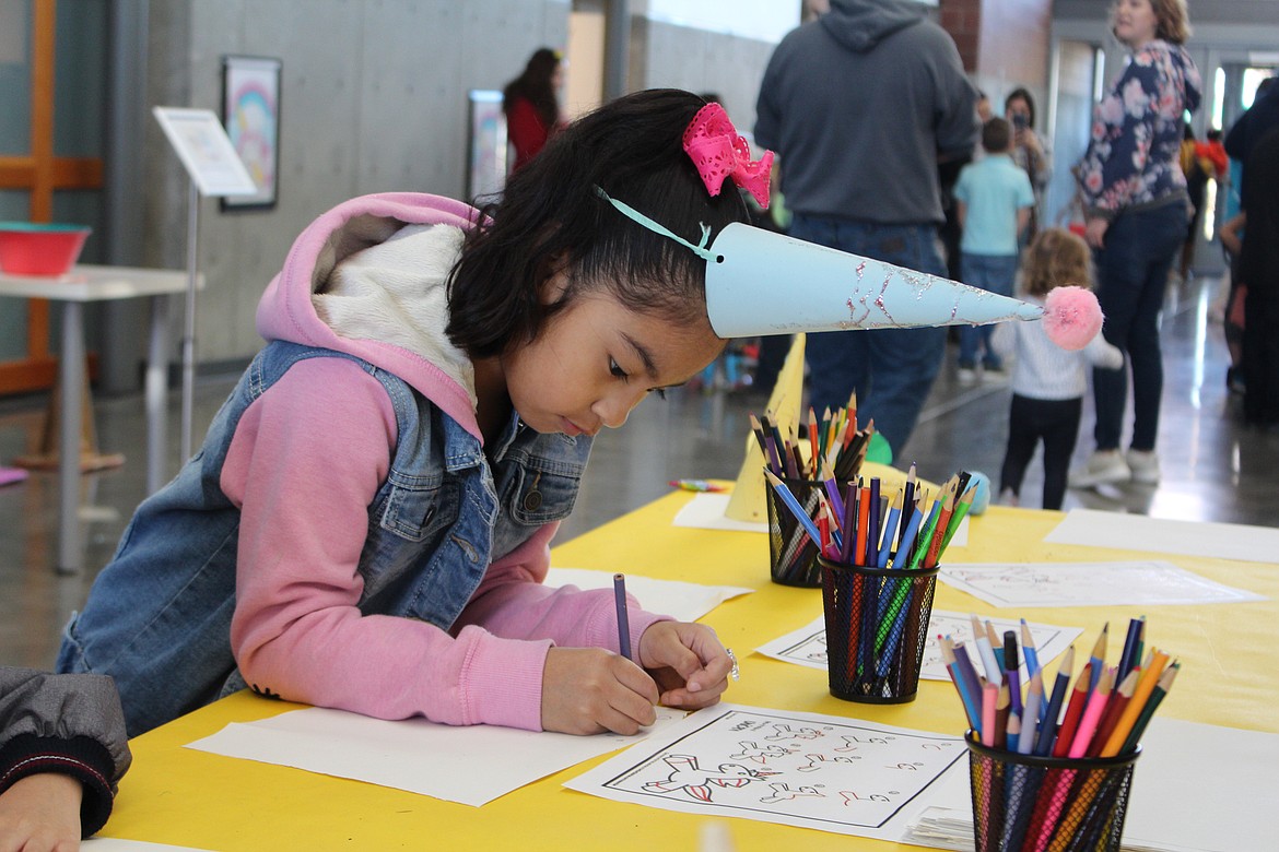 Cheryl Schweizer/Columbia Basin Herald
Sherlyn Estrada works on drawing a unicorn at Saturday&#146;s Unicorn Party at the Moses Lake Museum &amp; Art Center.