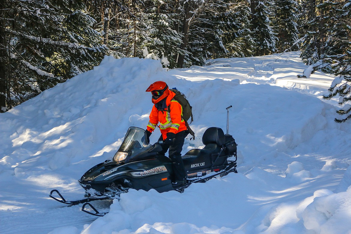 Photo by Mandi Bateman
Boundary Search and Dive Rescue Team volunteer Evan Phillips on the snowmobile during the mock search.