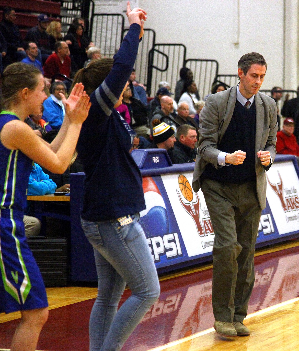 Rodney Harwood/Columbia Basin Herald
Big Bend Community College coach Preston Wilks reacts as the final buzzer sounds Wednesday night in Yakima, ensuring his Lady Vikings will qualify for the NWAC basketball championships for the first time in 15 years.