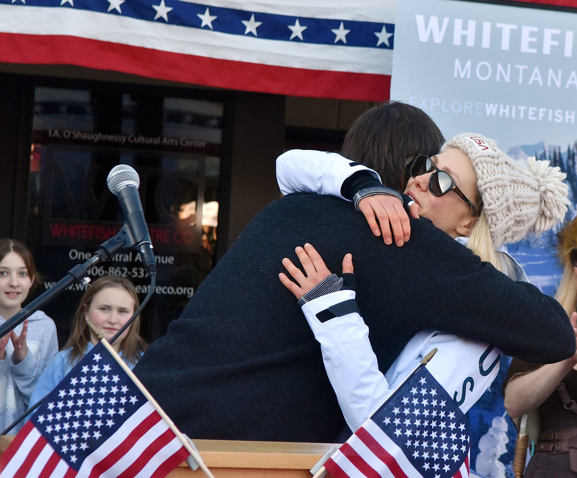 Whitefish Olympian Maggie Voisin hugs Mayor John Muhlfeld  Wednesday afternoon outside the O&#146;Shaughnessy Center after he named March 7, 2018 as Maggie Voisin Day. (Heidi Desch/Whitefish Pilot)