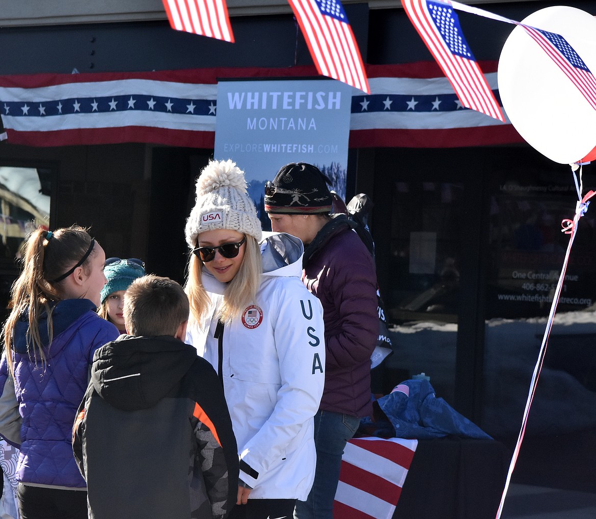 Whitefish Olympian Maggie Voisin&#146;s talks with young fans Wednesday afternoon outside the O&#146;Shaughnessy Center. (Heidi Desch/Whitefish Pilot)