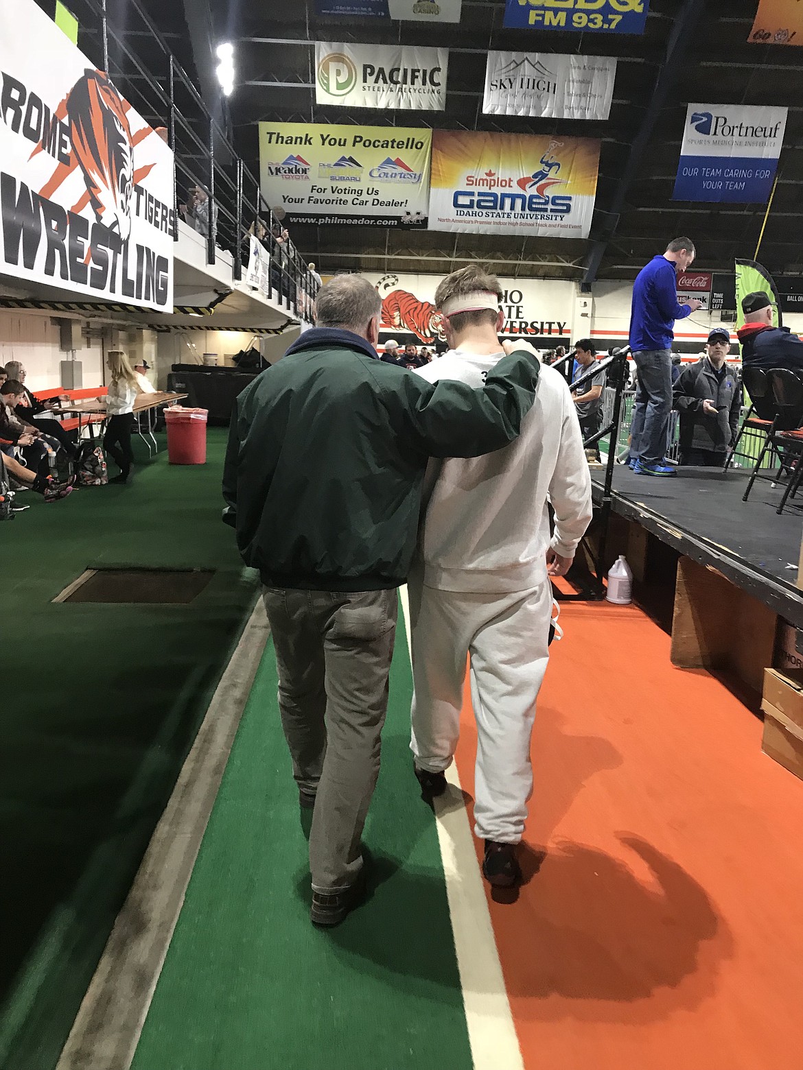 Photo by Greg See
&#147;I took this picture as Coach Garner was sharing encouraging words with my son (Gabe) as he was facing his biggest challenges in his wrestling career.&#148; &#151; Greg See