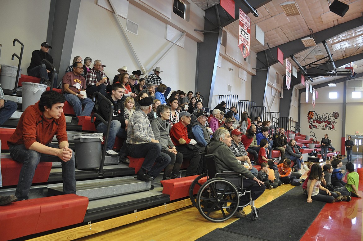 ONE HUNDRED people watch the Arlee Warriors defend their title at Arlee High School while enjoying complimentary popcorn. (Ashley Fox/Lake County Leader)