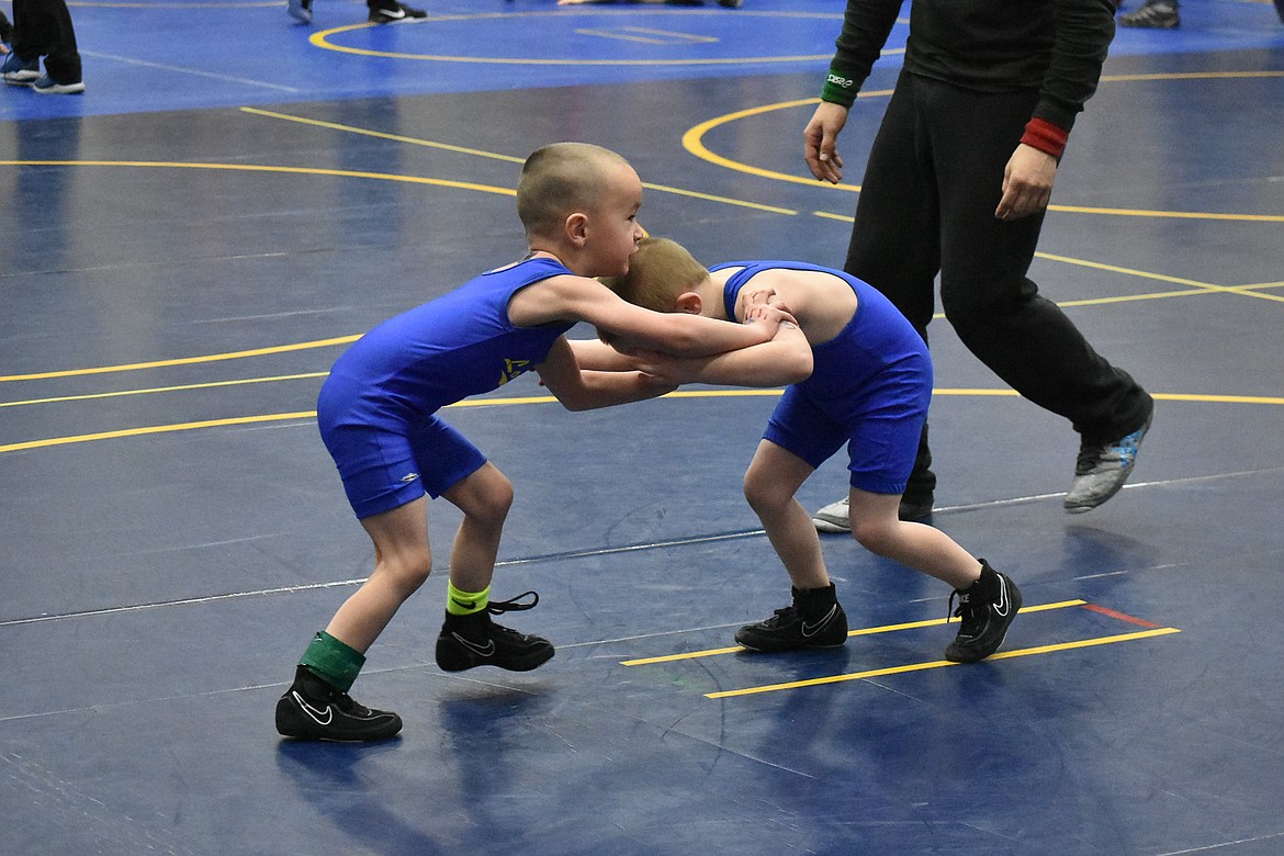 Justice Benjamin and James Masters grapple during the Kootenai Klassic, March 3. (Ben Kibbey/The Western News)