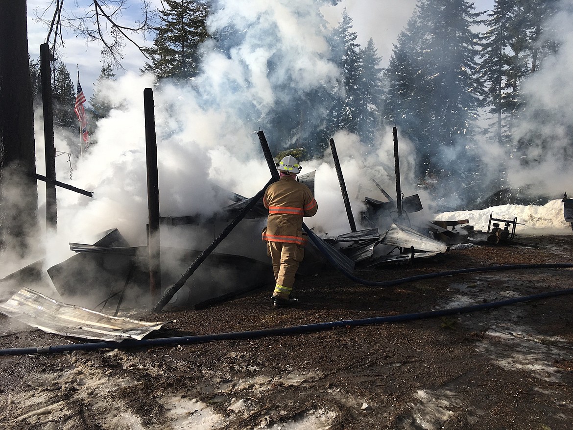 Courtesy Photo
When the firefighters arrived at the fire on 20 Mile Road the structure was already totally involved.