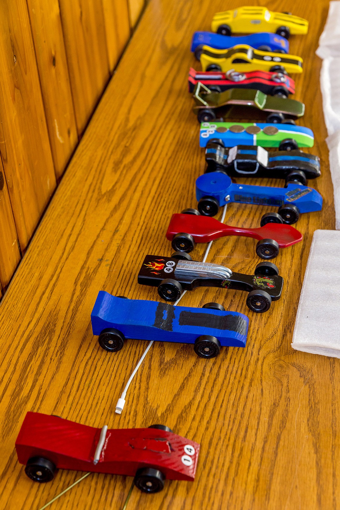 Pinewood Derby cars are lined up before the races began Friday, March 2, 2018. (John Blodgett/The Western News)