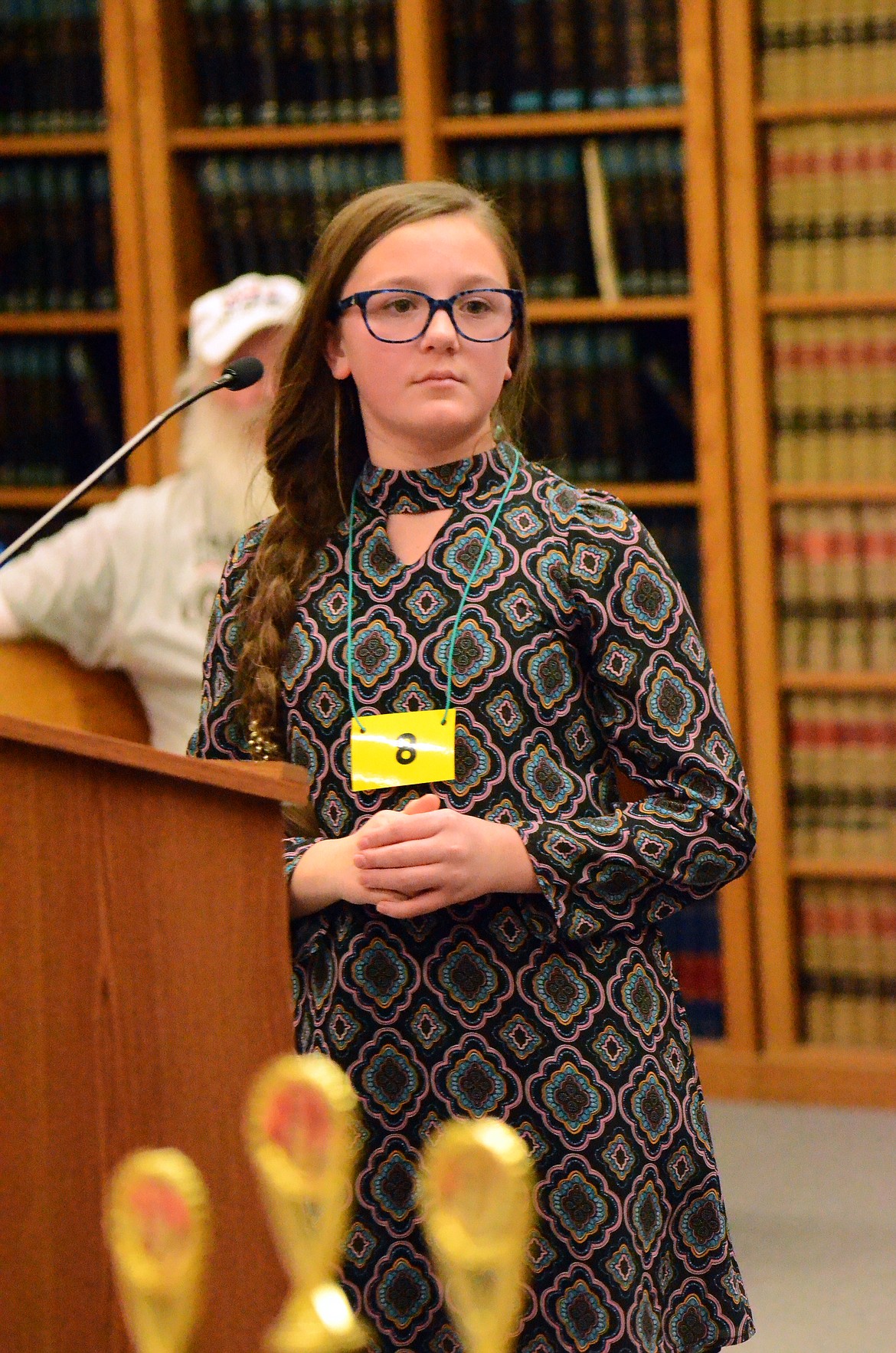 Fifth-grader Madalyn Homola from Hot Springs keeps her cool as she listens to her word to spell.