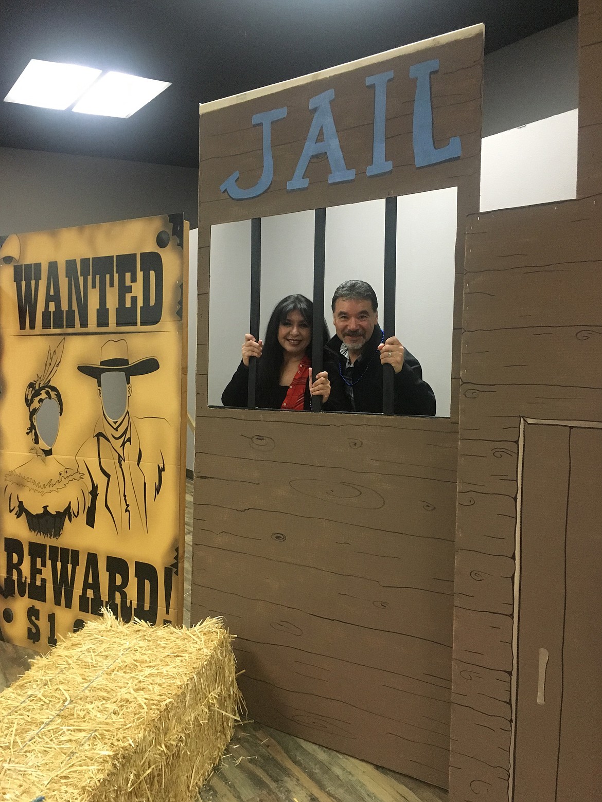 Chanet Stevenson/The Sun Tribune - Attendees stop out to check the western themed photo backdrops during the Annual Chamber Awards Banquet held Feb. 23.