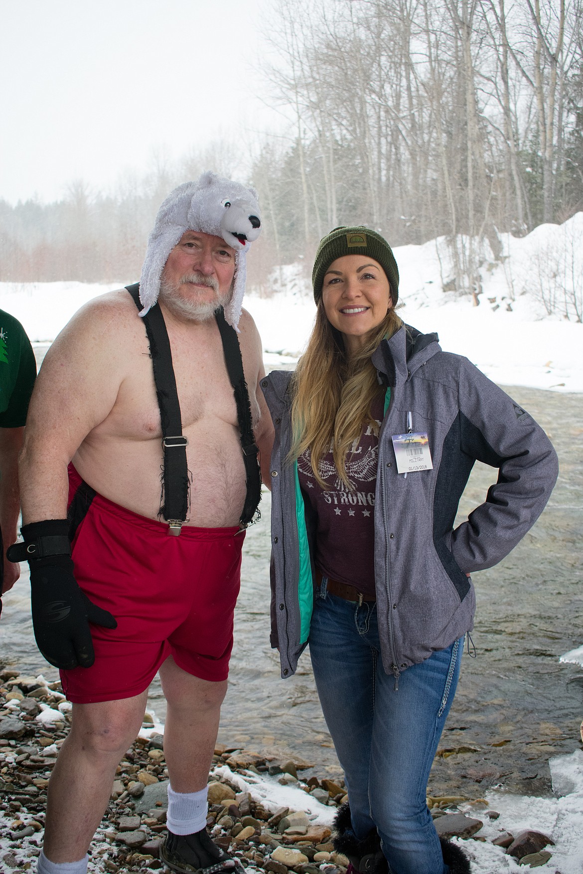 Amber Hargrove poses with Rick &#147;Polar Bear Rick&#148; Klin by Libby Creek on Feb. 25. (Ben Kibbey/The Western News)