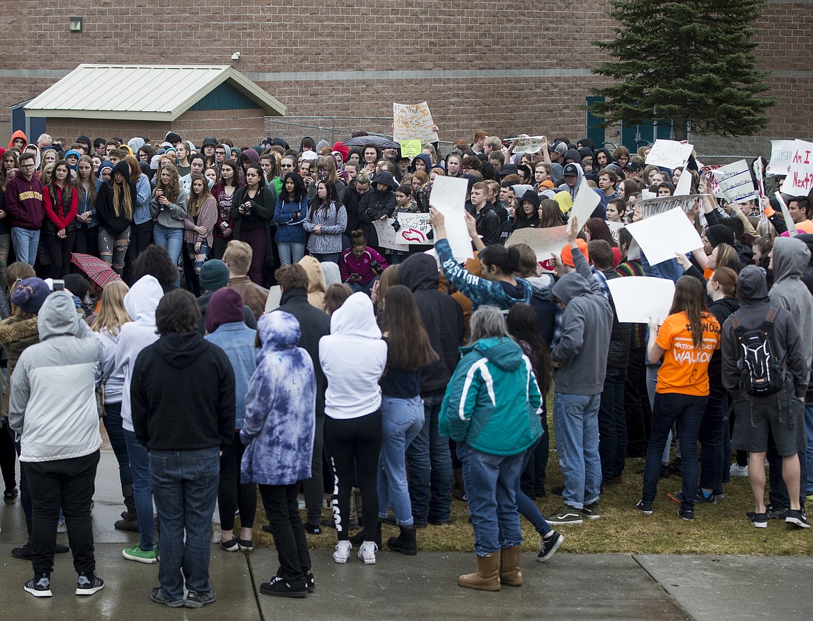 LOREN BENOIT/Press
Hundreds of students gather near the softball fields at Lake City High School to protest gun violence during the National School Walkout on Wednesday.