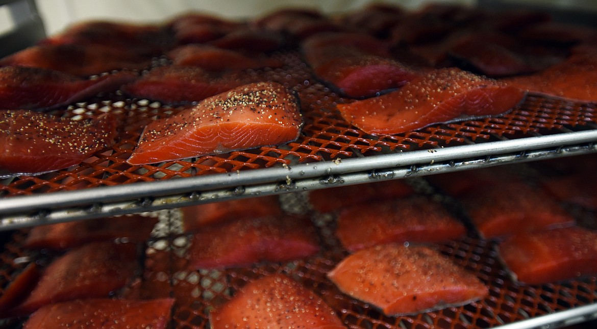 Salmon ready to go into the smoker at Kvichak Fish Company on Tuesday, March 13.(Brenda Ahearn/Daily Inter Lake)