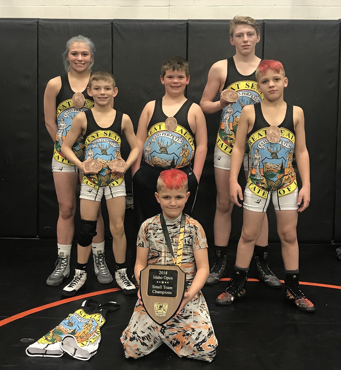 A group of Team Real Life wrestlers traveled to Meridian for the inaugural edition of the Idaho Open. This is a new tournament sponsored by Idaway wrestling and USA Wrestling. Team Real Life won the small team award. Pictured below holding the small team plaque is Matthew Hamilton, 3rd. Also pictured are Devine Hill, champion; Rider Seguine, champion in two classes; Caleb Alverson, champion; Johnny Hill, champion and Damion Hamilton, champion.
Courtesy photo