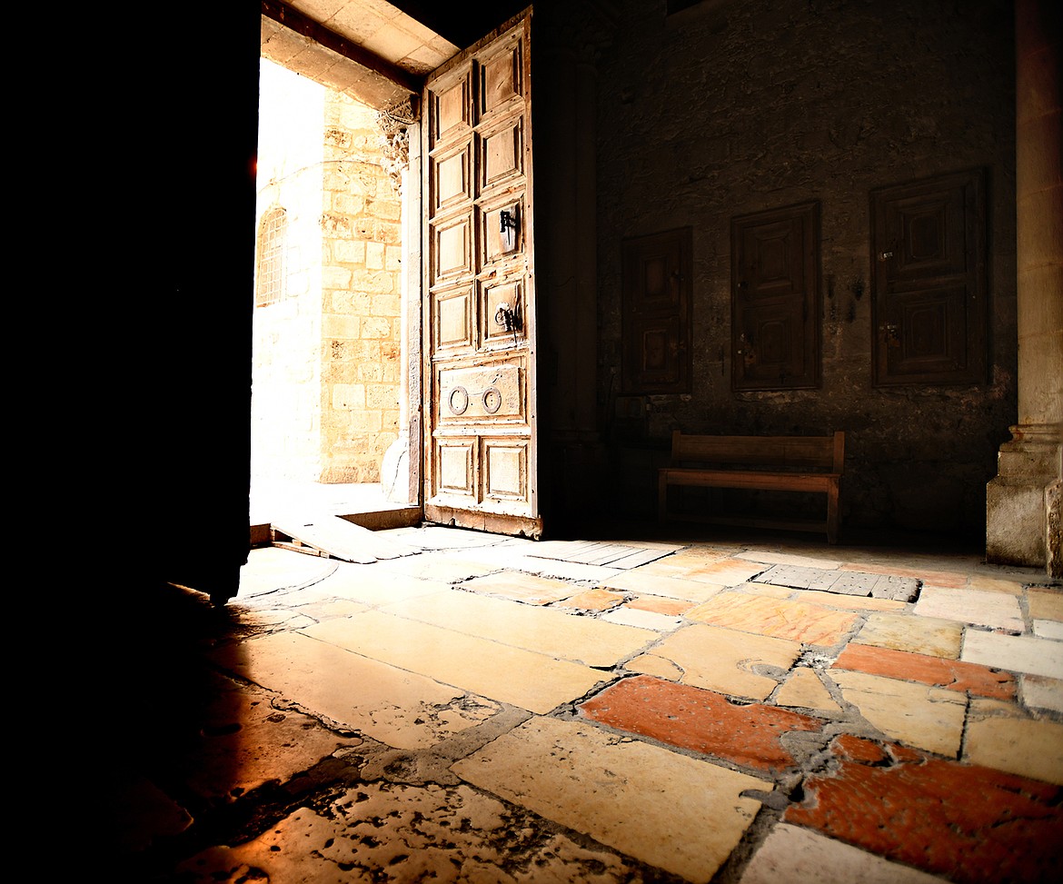 View of the doors and ancient floor of the Church of the Holy Sepulchre in Jerusalem. The church contains Stations 10-14 of the traditional Catholic prayer the Stations of the Cross which commemorate the route Jesus took to the crucifixion.(Brenda Ahearn/Daily Inter Lake)&#160;