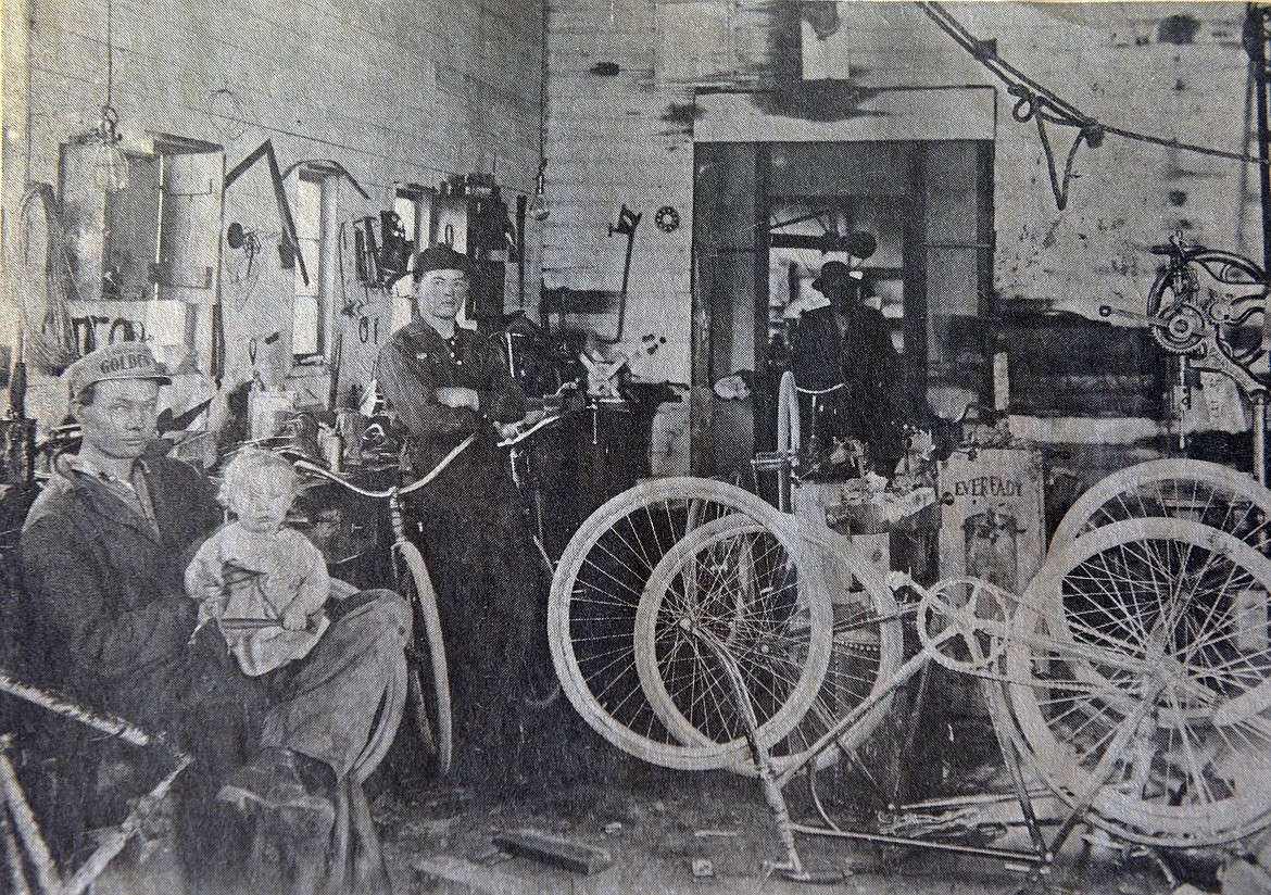 The descendants of Frank Wheaton say he could &#147;Do anything. Fix anything.&#148; Frank was in his twenties when the photo here was taken. Cute little guy on his lap was Bernard. This week Bernard and Lucille Wheaton sold their stores and an era is ended. Anyone who has been around Kalispell for very long, knows that Bernard has spent his life in the bicycle shop, and it wasn&#146;t &#147;nine to five.&#148;