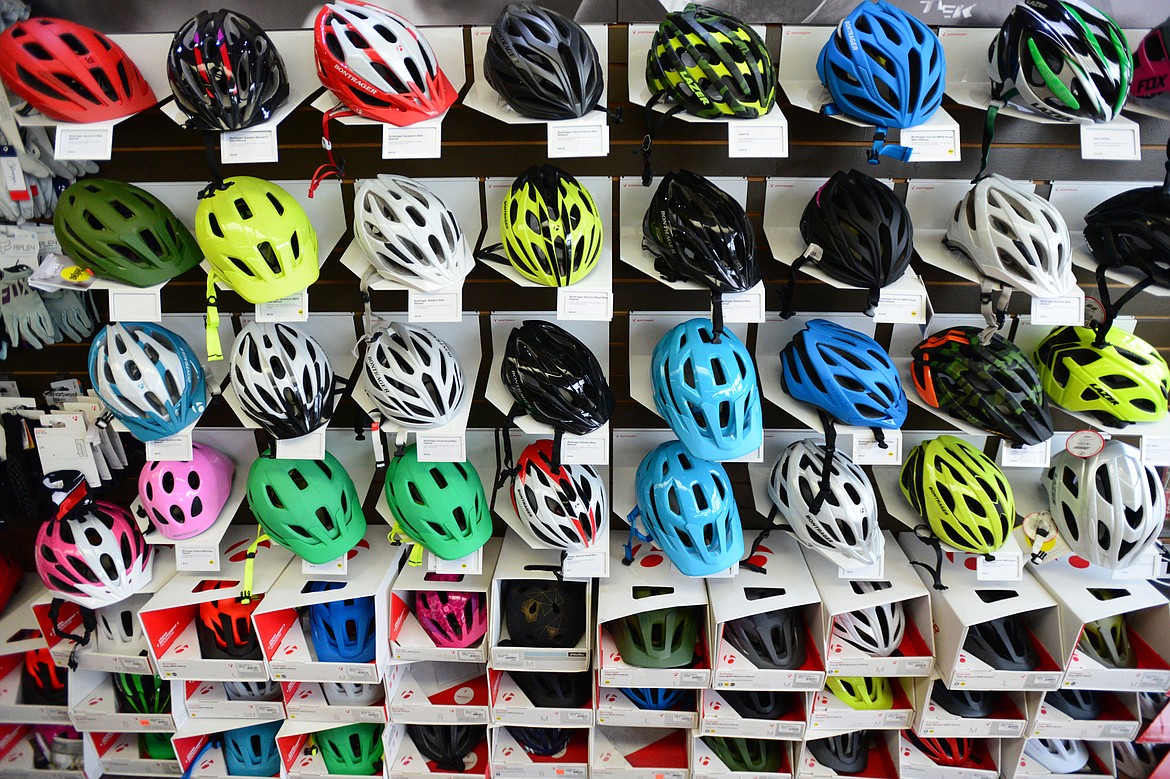 Bike helmets on display at Wheaton&#146;s Cycle in Kalispell on Thursday, March 8. (Casey Kreider/Daily Inter Lake)