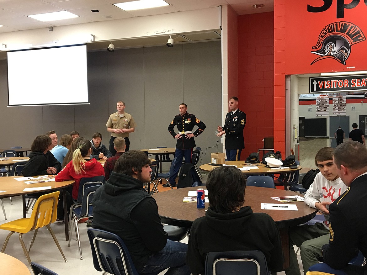 (Photo courtesy PRIEST RIVER LAMANNA HIGH SCHOOL)Military recruiters talk to interested Priest River Lamanna High School students during the school's Higher Ed Tour on Tuesday.