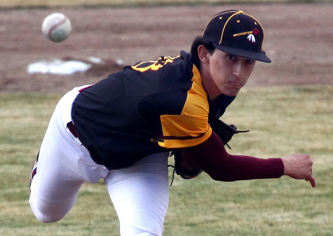 Rodney Harwood/Columbia Basin HeraldOpening day starter Vance Alvarado delivers to the plate during Moses Lake's non-league game with Graham Kapowsin on Friday at Larson Playfield.