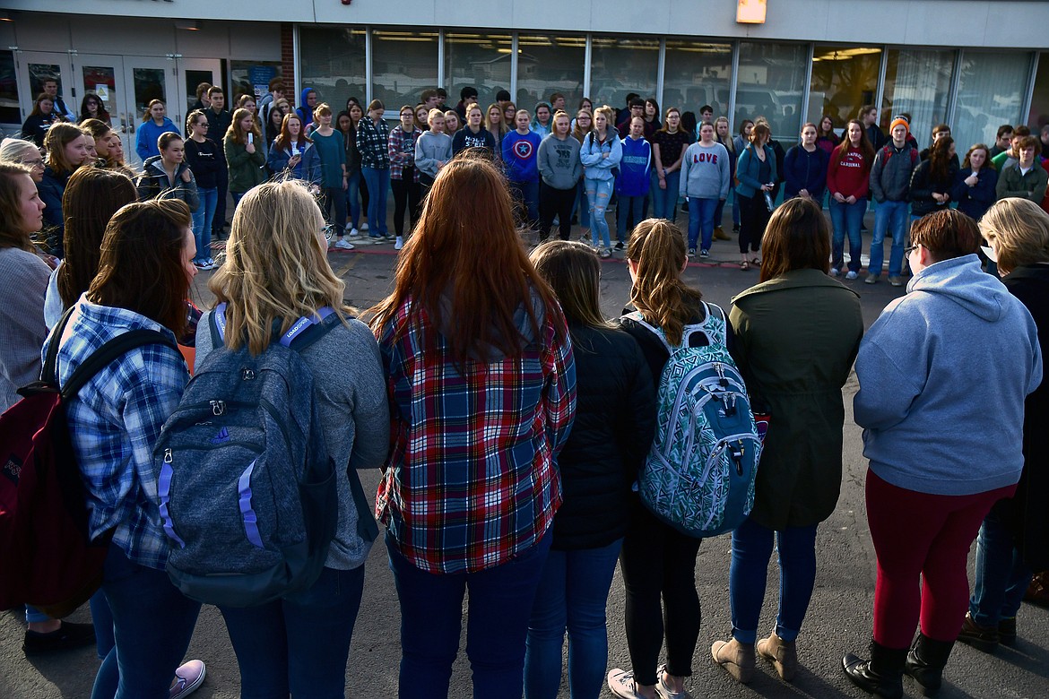 Dozens of Columbia Falls High School students joined students around the nation in a walkout Wednesday morning to memorialize students killed and injured in the shooting at Marjory Stoneman Douglas High School in Florida February 14. (Jeremy Weber photo)