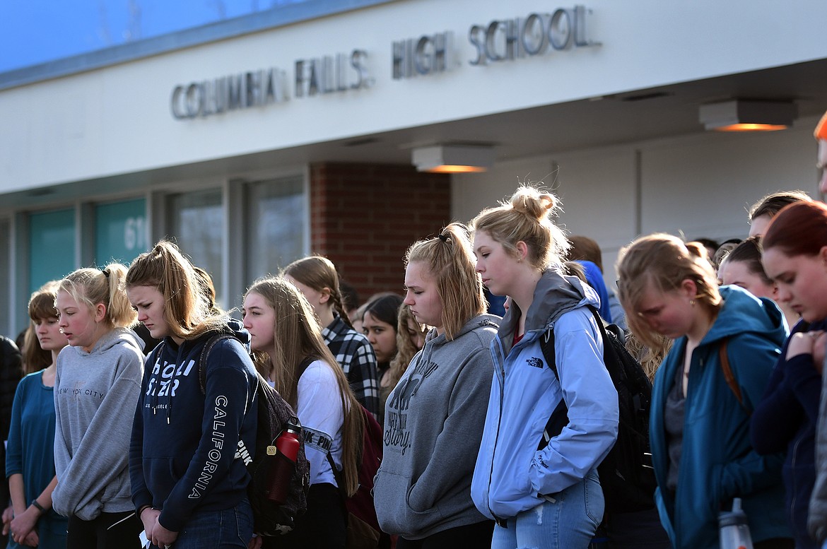 Dozens of Columbia Falls High School students joined students around the nation in a walkout Wednesday morning to memorialize students killed and injured in the shooting at Marjory Stoneman Douglas High School in Florida February 14. (Jeremy Weber photo)