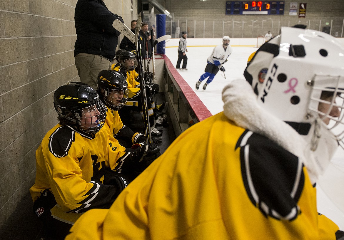 Boise Knights players take a breather on the bench during Friday night&#146;s game against Cristeros.