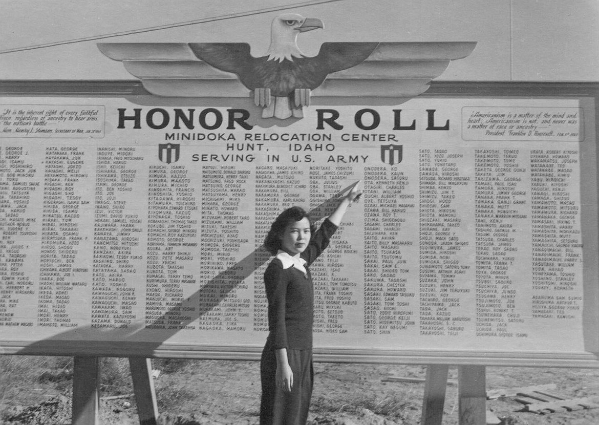 NATIONAL PARK SERVICE
Fumi Onodera, 20, points at the names of her three brothers, Ko, Kaun, 24; and Satoru, 22, on the Minidoka, Idaho, detention camp Honor Roll of Japanese Americans.