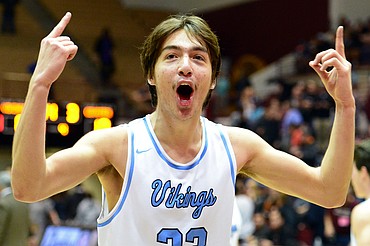 Bigfork's Beau Santistevan celebrates after a 60-56 state championship victory over Shelby at Dahlberg Arena in Missoula on Saturday, March 10. (Casey Kreider/Daily Inter Lake)
