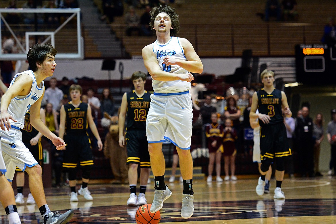 Bigfork's Anders Epperly celebrates in the final moments of a 60-56 win over Shelby in the championship of the 2018 State Class B Boys' Basketball Tournament at Dahlberg Arena in Missoula on Saturday, March 10. (Casey Kreider/Daily Inter Lake)