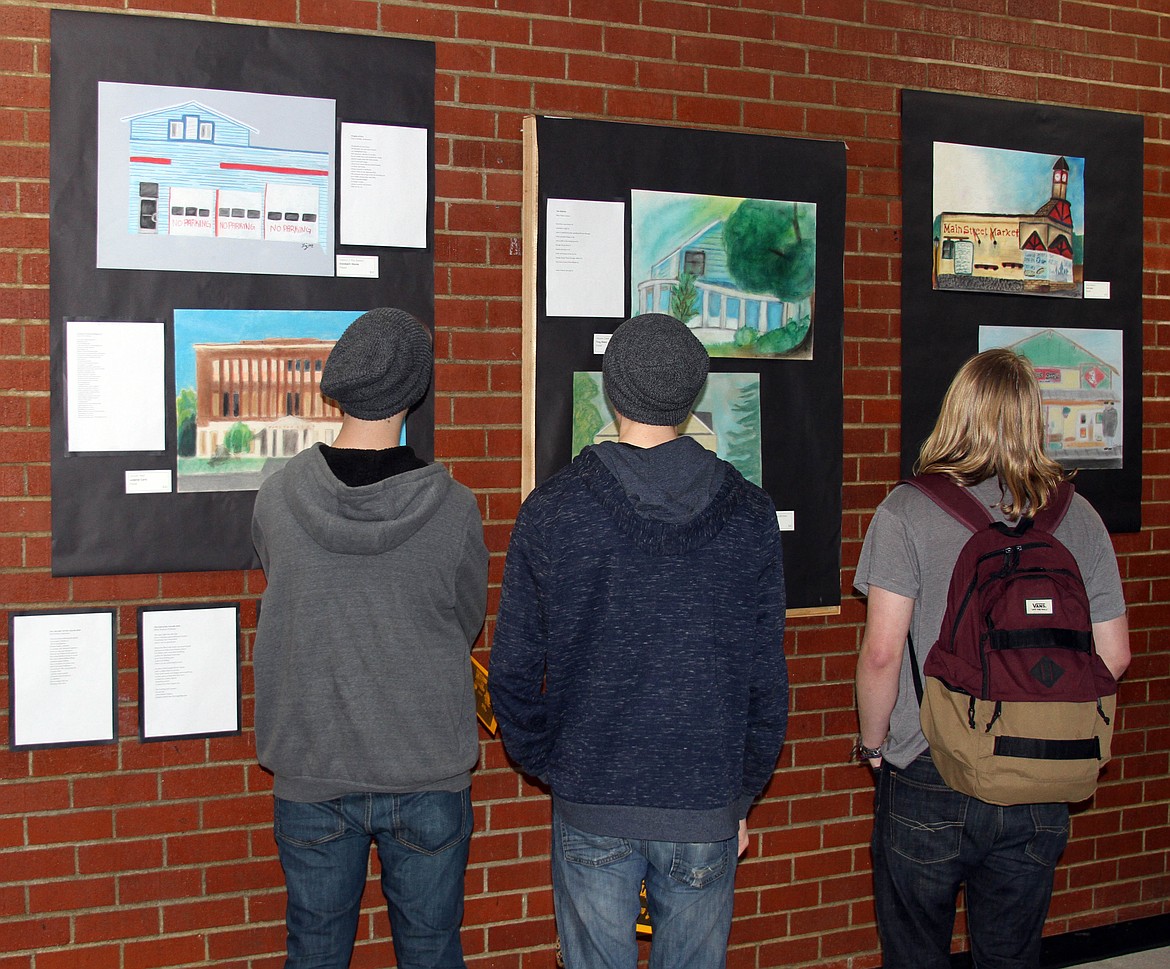 Students take in some of the pastel works of art during Kellogg High School&#146;s special art and poetry event.
