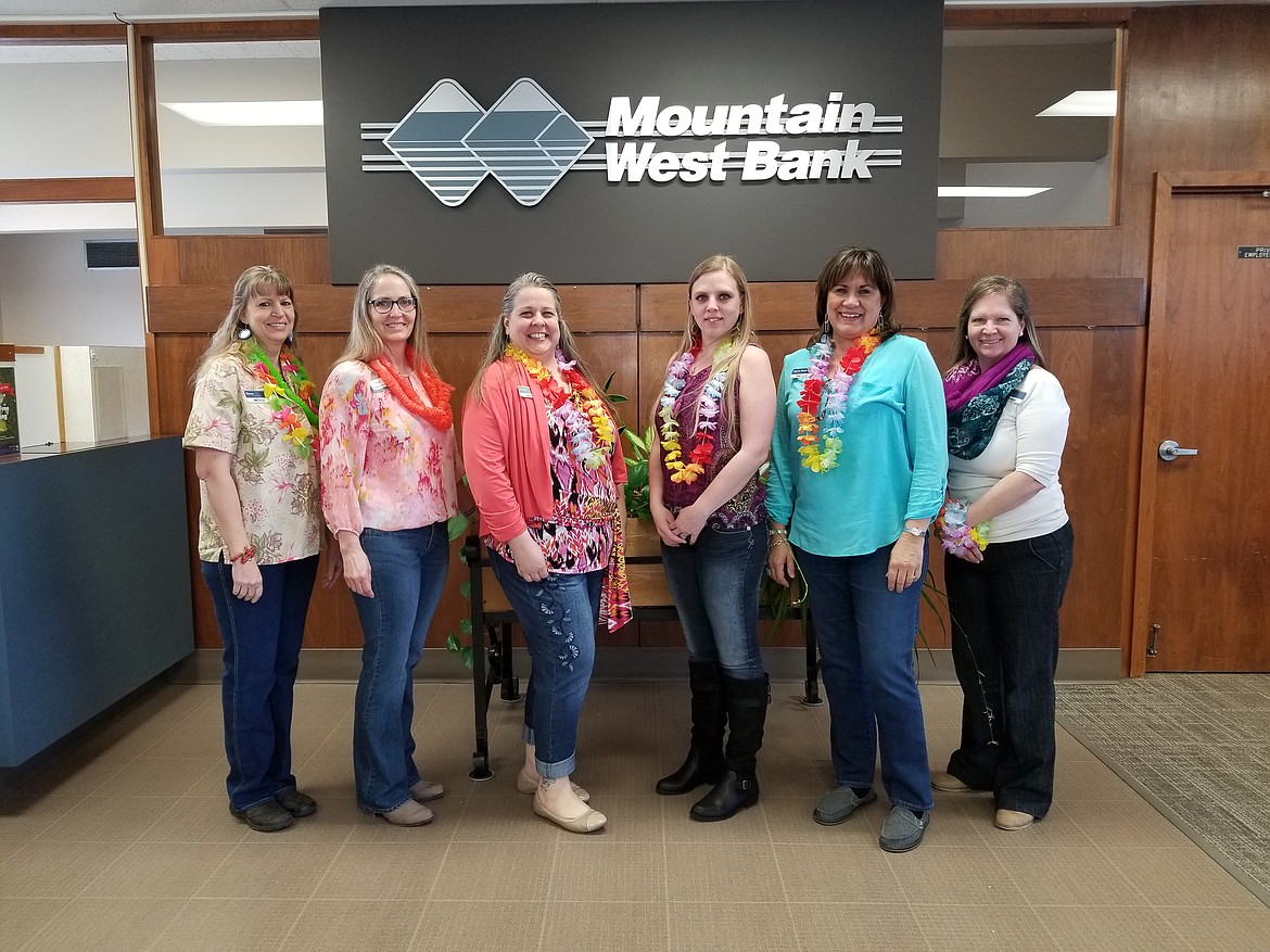 The ladies at Mountain West Bank feel the spirit of Hawaiian Days. From left: Diane Eisenhour, Stacy Leonard, Teresa Norman, Samantha Young, Jayne Fitch, and Teshra Robles.

Photo by Mandi Bateman